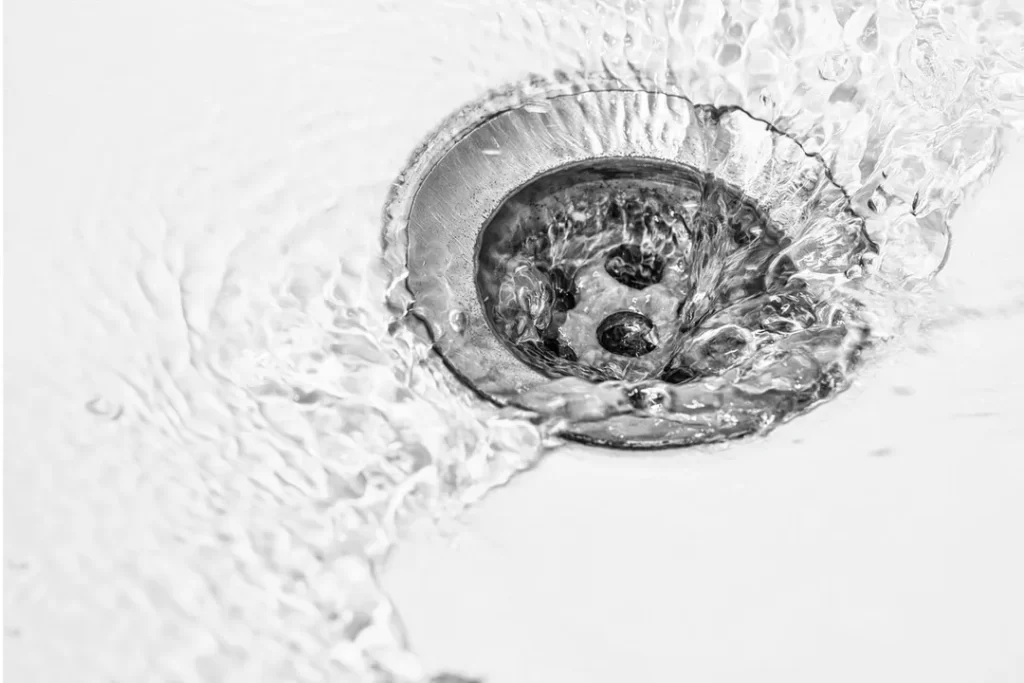 water flowing down a drain